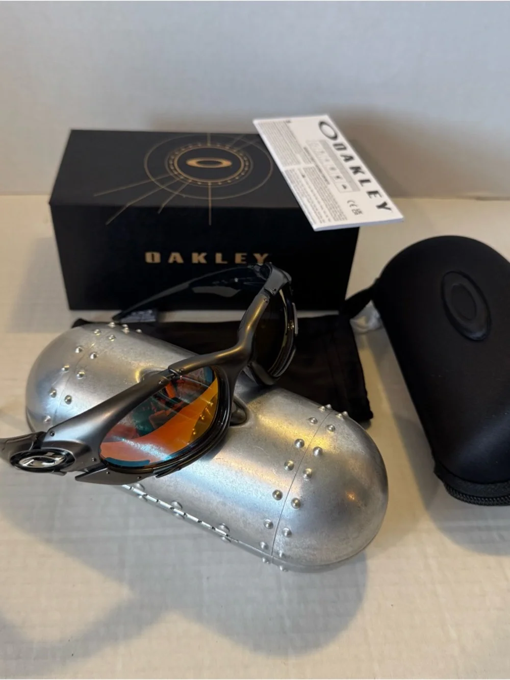 Oakley Black Sunglasses with Orange Mirror Lenses